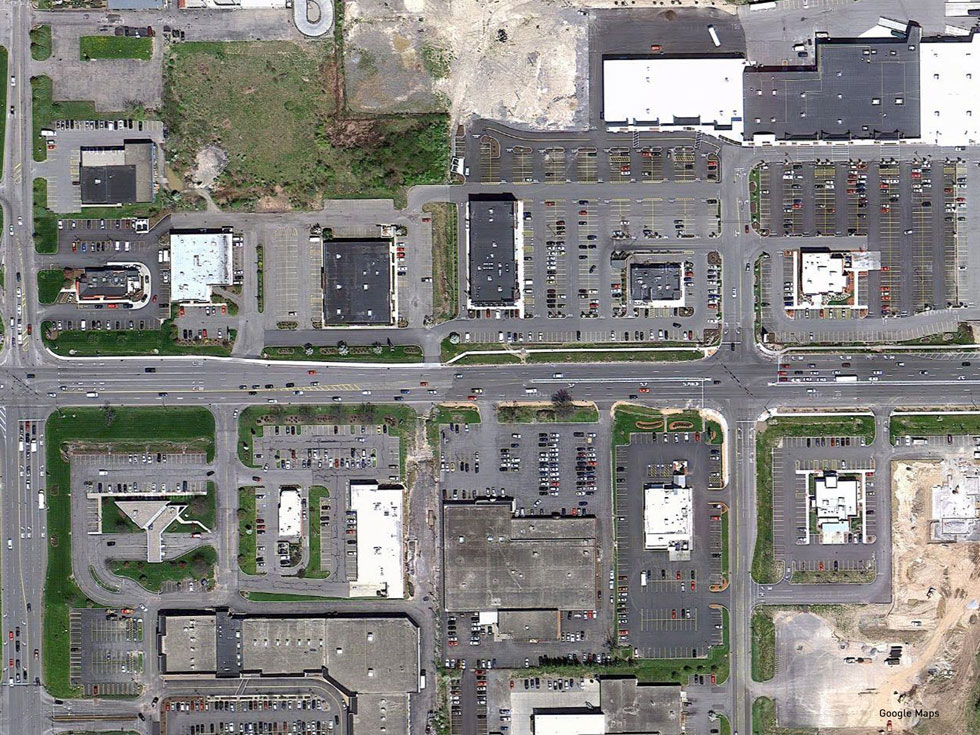 Satellite image of a section of Jefferson Road in Henrietta, NY. Places designed around the automobile.
