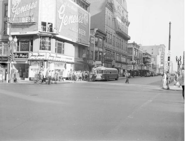 Storefronts at Main Street and Clinton, Rochester NY. Check out the old RTS bus.